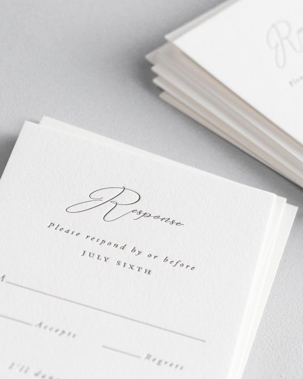 Dreamy close up shot of Alyssa response cards. Deep impressions in the paper are a result of the letterpress printing process.