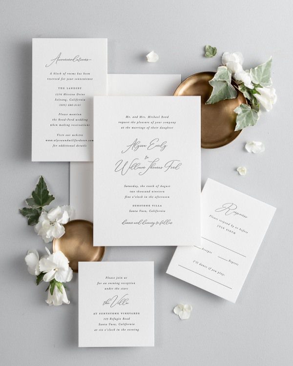 All pieces of the Alyssa letterpress wedding invitation suite, including the invitation, small and large enclosures, and response card.