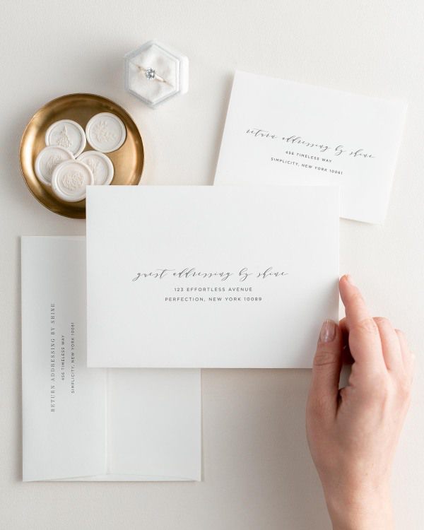 Amelia letterpress wedding invitation envelopes. The response envelope showcases our return addressing service, while the outer envelopes shows both guest and return addressing options.