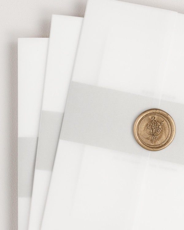 Wedding invitations with vellum jacket and wax seal