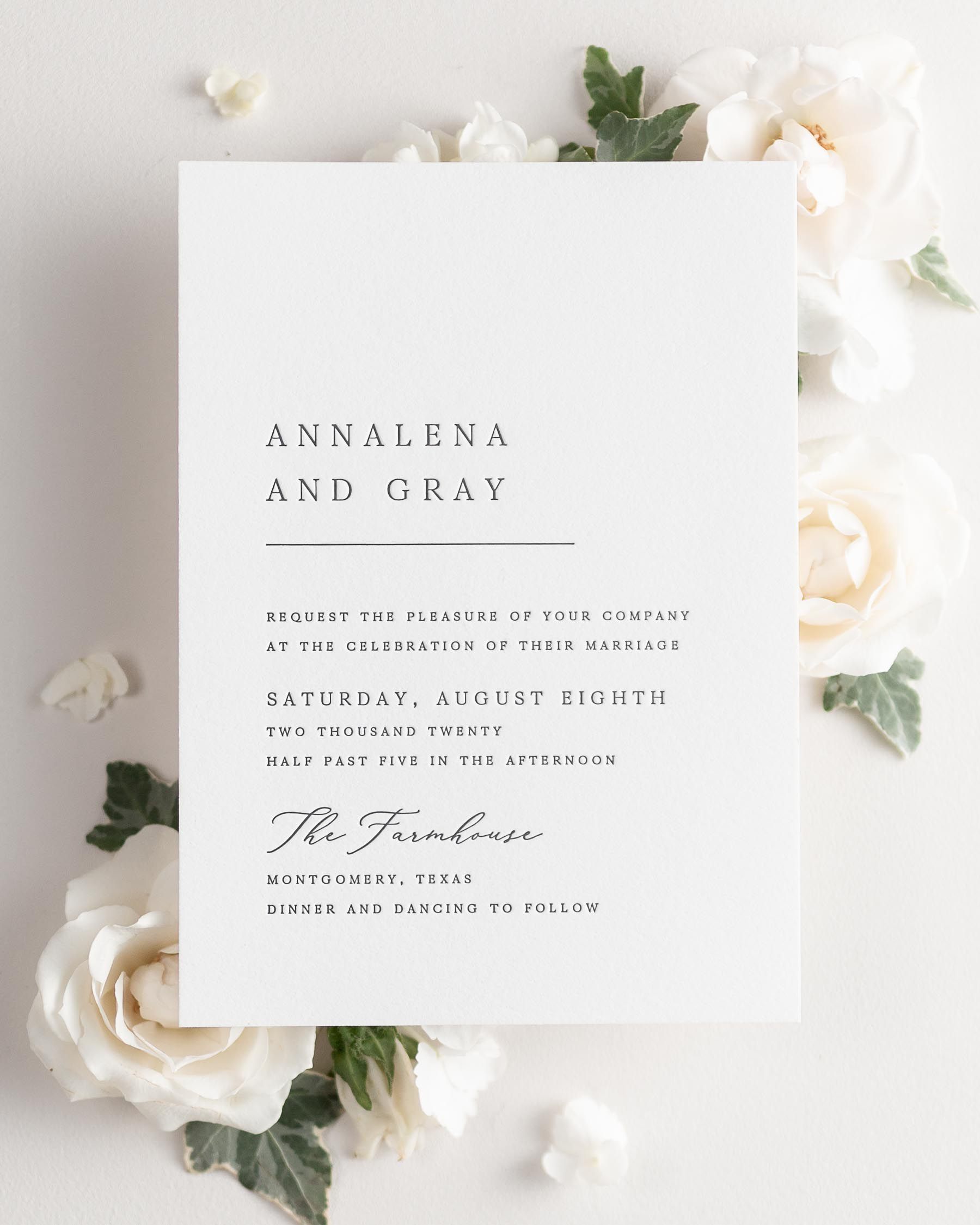 Annalena letterpress wedding invitation styled with pretty florals.