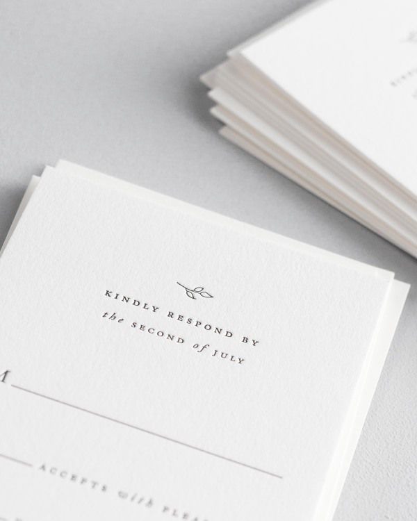 Dreamy close up shot of Aurora response cards. Deep impressions in the paper are a result of the letterpress printing process.