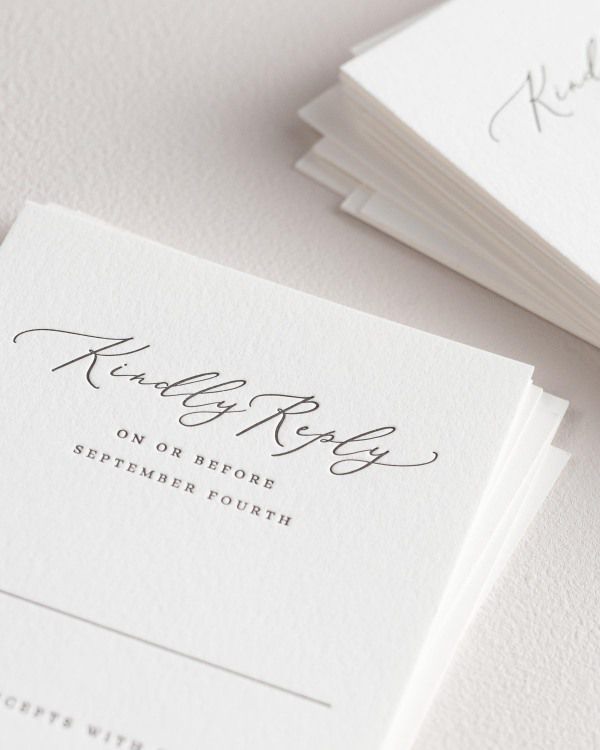 Dreamy close up shot of Austin response cards. Deep impressions in the paper are a result of the letterpress printing process.