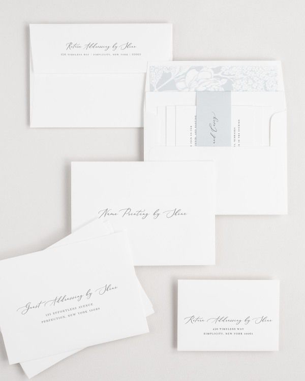 Austin wedding invitation envelopes with guest addressing, return addressing, and name printing services. Inner envelope features a hydrangea liner and cloud belly band.