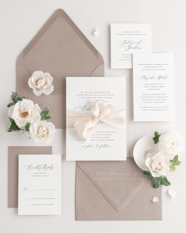 Wedding invitations with silk ribbon in light brown envelope