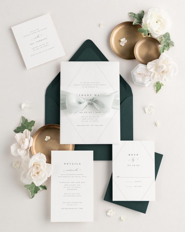 Wedding invitations with silk ribbon in green envelope