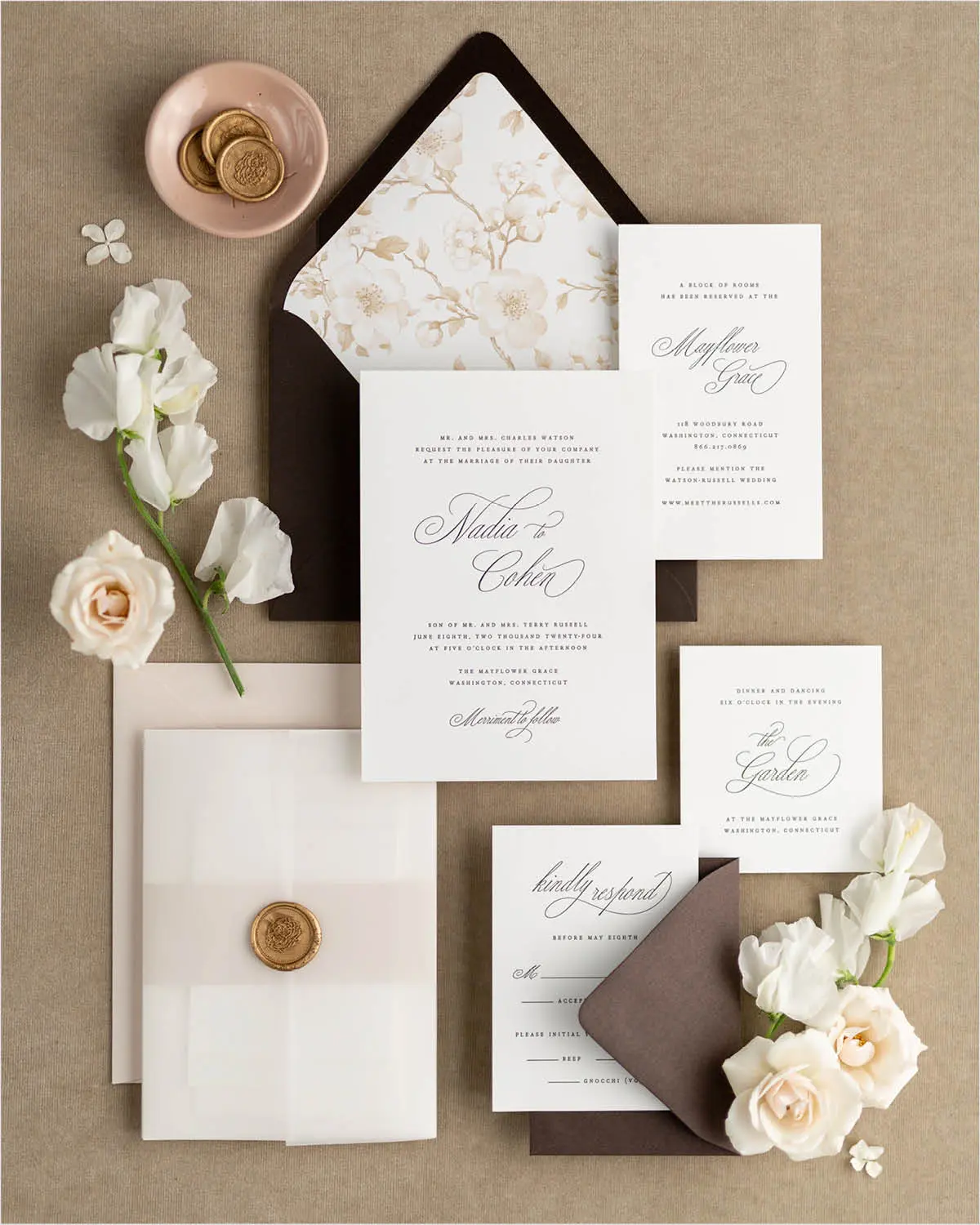 Naida Letterpress Wedding Invitations with dark brown and almond envelopes and nude envelope liner and belly band, vellum jacket and gold wax seal