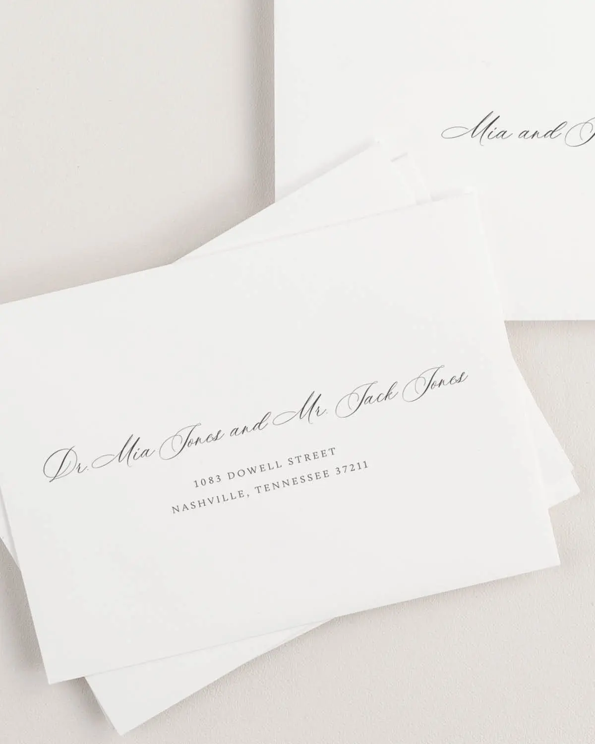 A Wedding Invitation Addressed to a Married Couple Where One Guest is a Doctor