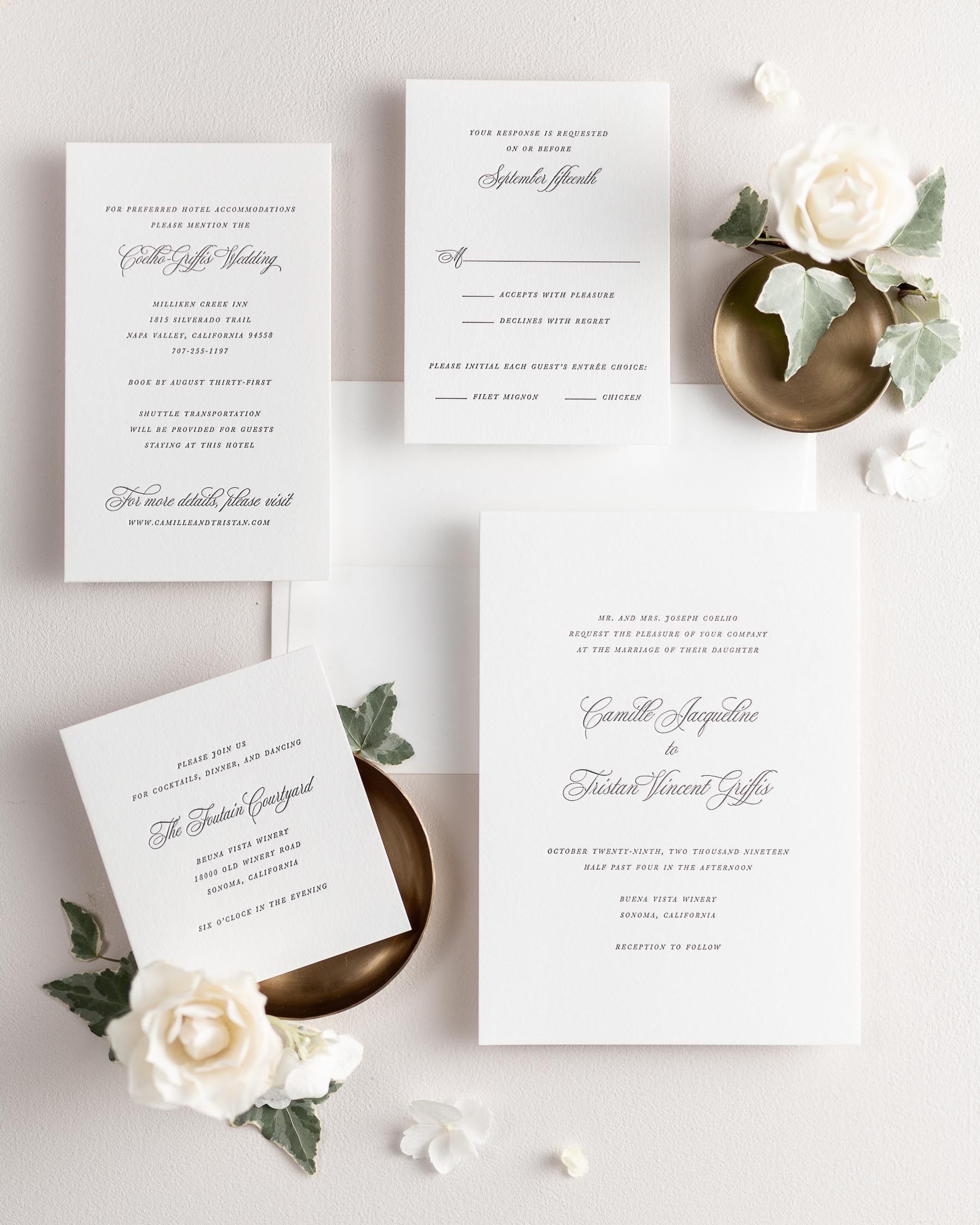All pieces of the Camille letterpress wedding invitation suite, including the invitation, small and large enclosures, and response card.