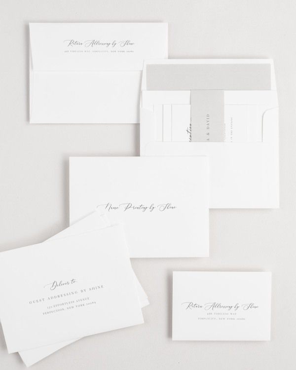 Chelsea wedding invitation envelopes with guest addressing, return addressing, and name printing services. Inner envelope features a solid liner and stone belly band.