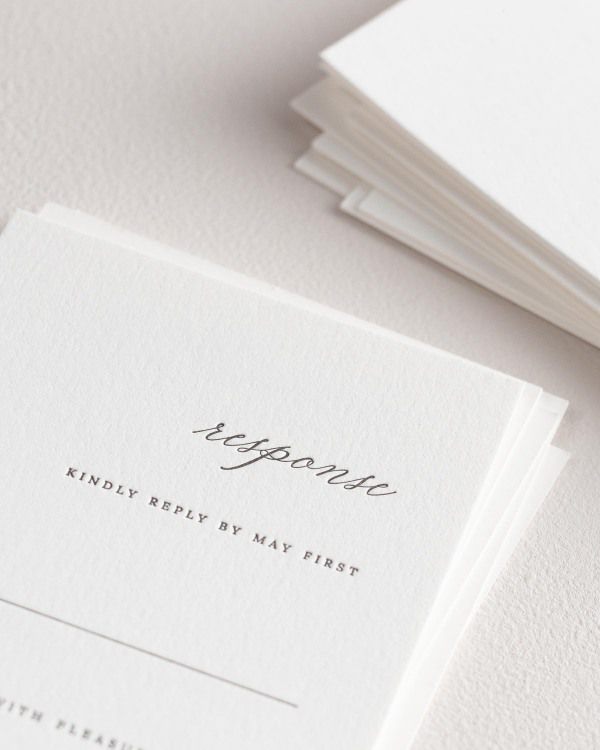 Dreamy close up shot of Chloe response cards. Deep impressions in the paper are a result of the letterpress printing process.