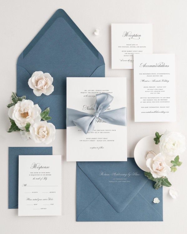 Wedding invitations with silk ribbon and chambray blue envelope