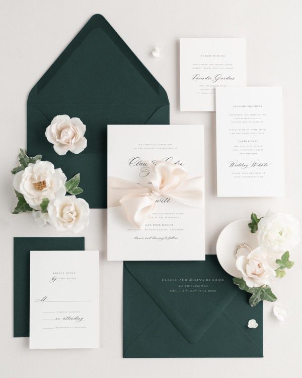 Wedding invitations with silk ribbon in green envelope