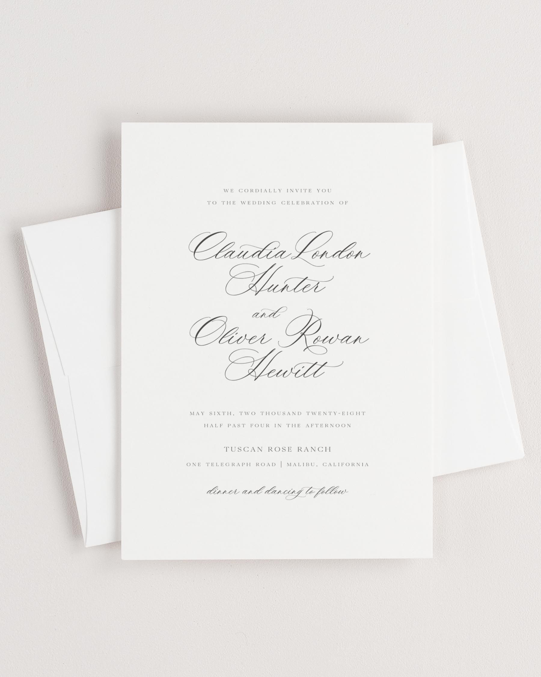 Simple close-up of Claudia invitation with an envelope.