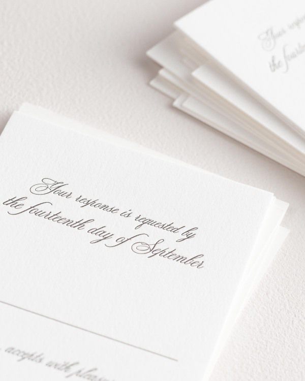 Dreamy close up shot of Danielle response cards. Deep impressions in the paper are a result of the letterpress printing process.