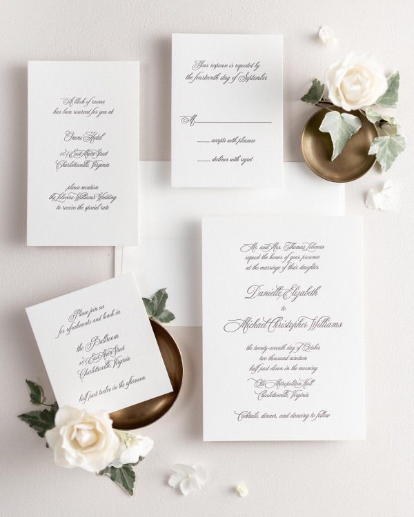 All pieces of the Danielle letterpress wedding invitation suite, including the invitation, small and large enclosures, and response card.