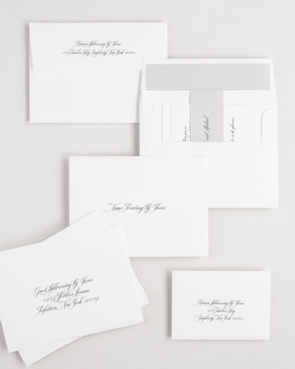 Danielle wedding invitation envelopes with guest addressing, return addressing, and name printing services. Inner envelope features a solid liner and stone belly band.