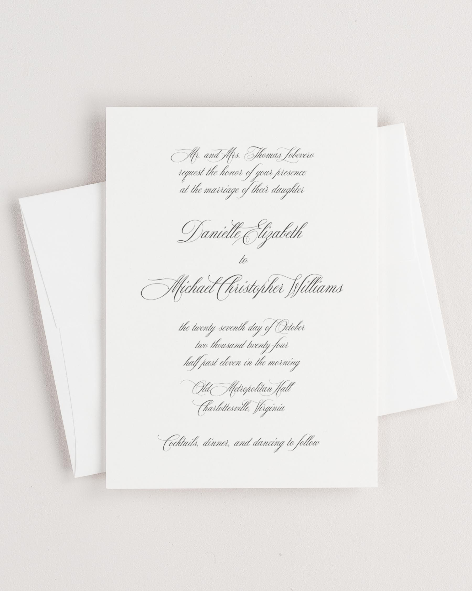 Simple close-up of Danielle invitation with an envelope.