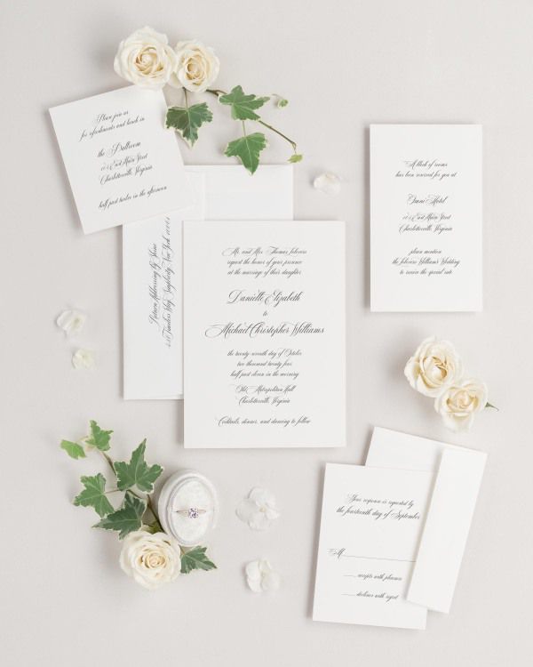 Danielle wedding invitations flat lay with