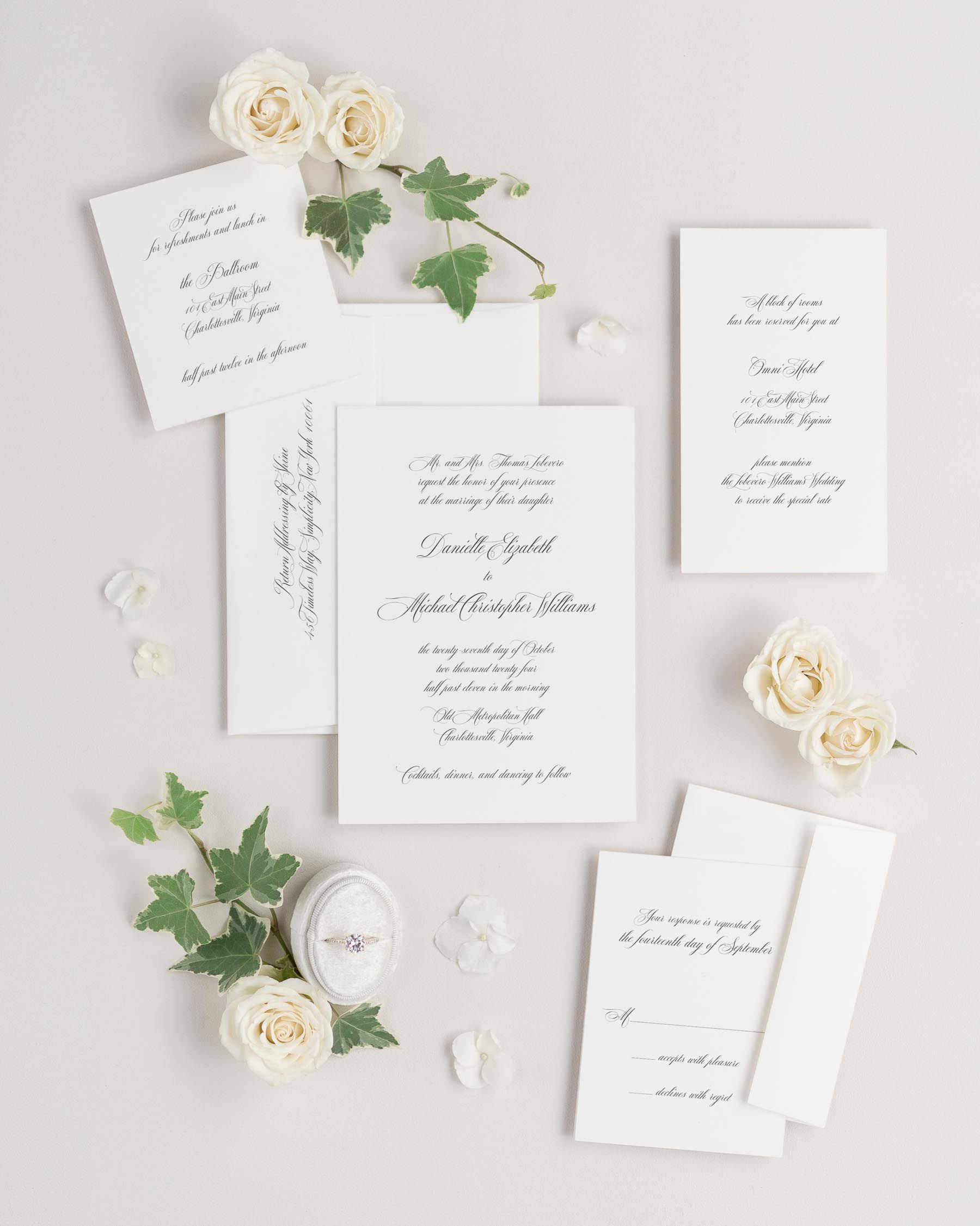 Danielle wedding invitations flat lay with
