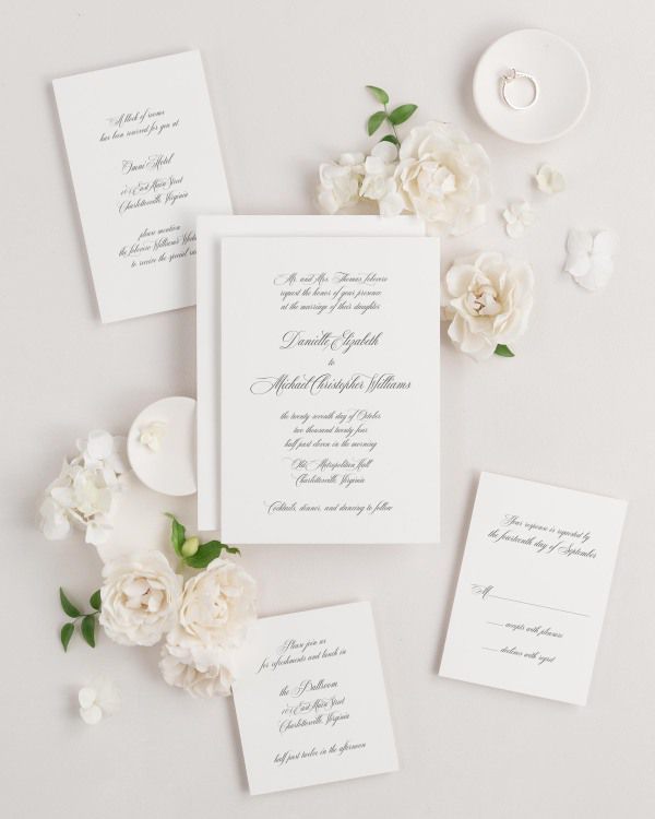 Danielle wedding invitations flat lay with