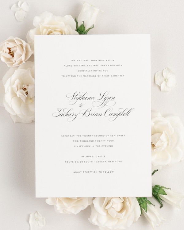 Delicate Elegance wedding invitation framed with dreamy florals.