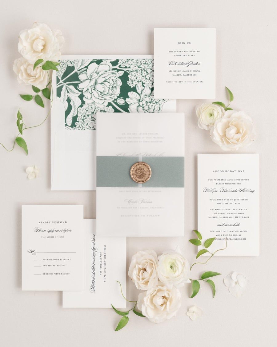 Elizabeth wedding invitation with a belly band, translucent vellum jacket, and wax seal.