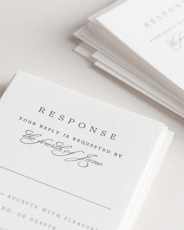 Dreamy close up shot of Ella response cards. Deep impressions in the paper are a result of the letterpress printing process.