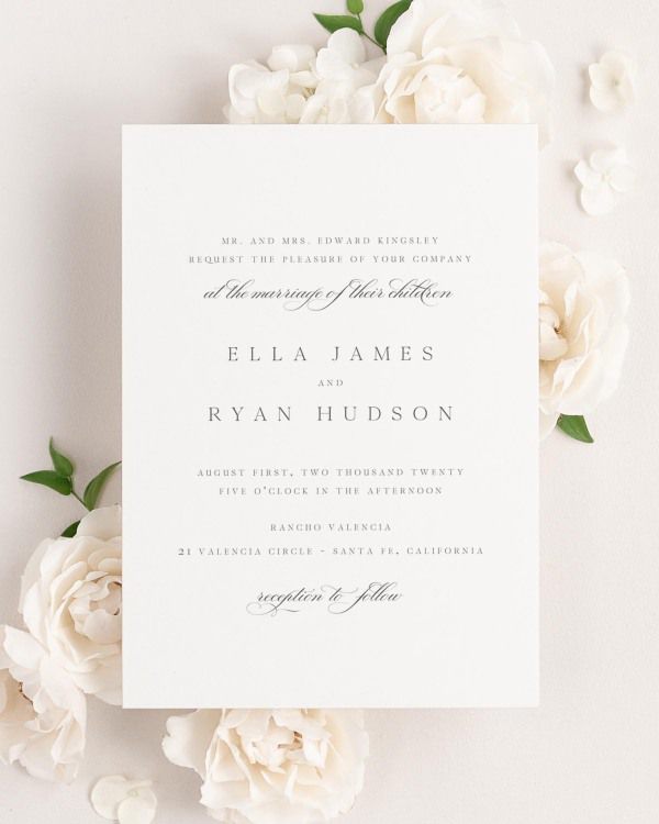 Ella wedding invitation framed with dreamy florals.