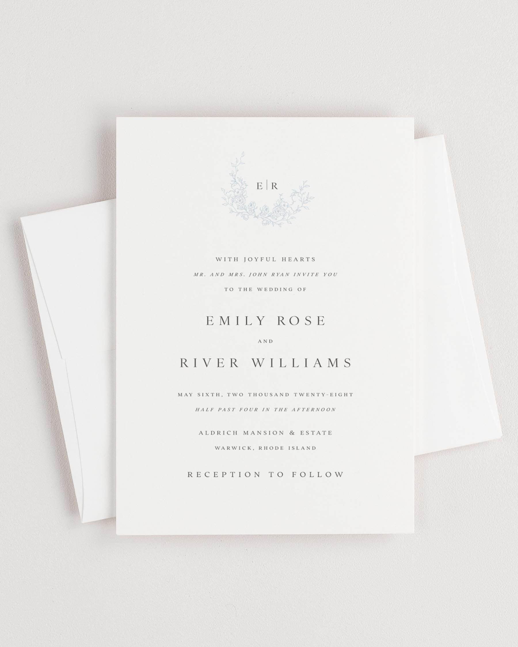 Simple close-up of Emily invitation with an envelope.