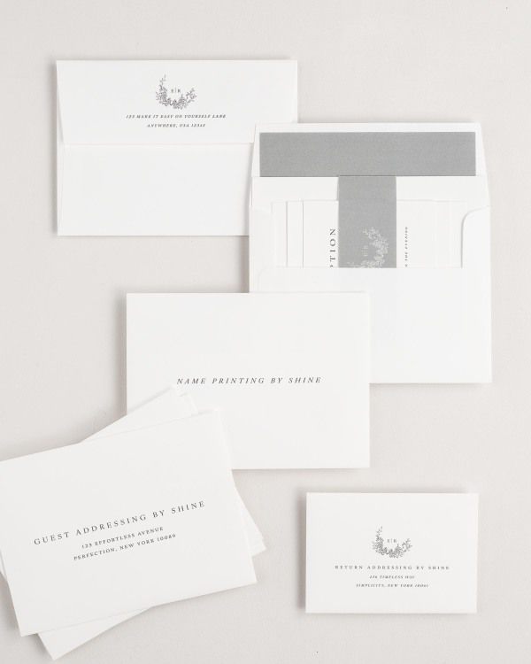 Emily wedding invitation envelopes with guest addressing, return addressing, and name printing services. Inner envelope features a liner and belly band.