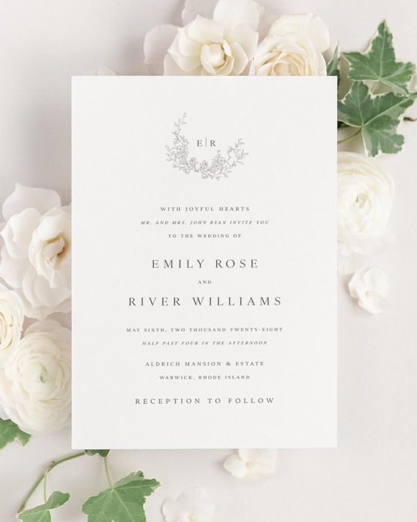 Emily wedding invitation framed with dreamy florals.