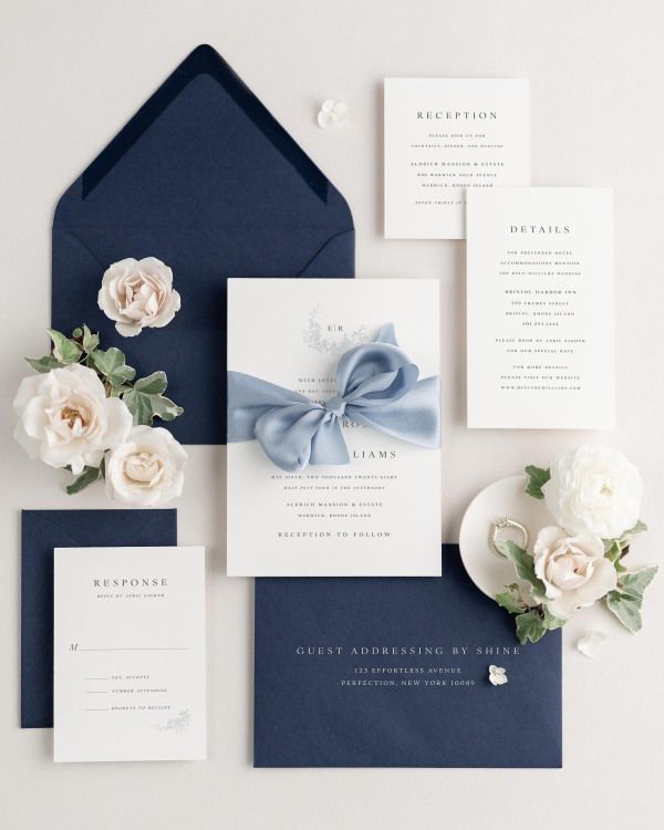 Wedding invitations with silk ribbon and navy blue envelope