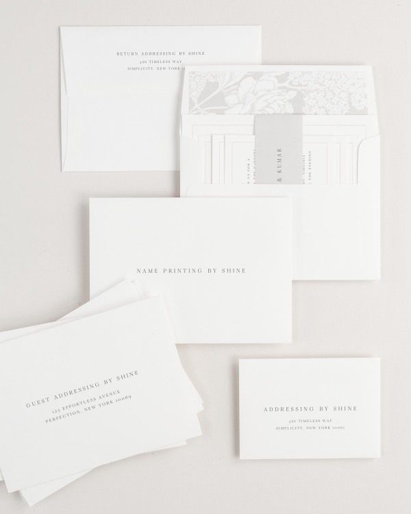 Emma wedding invitation envelopes with guest addressing, return addressing, and name printing services. Inner envelope features a liner and  belly band.