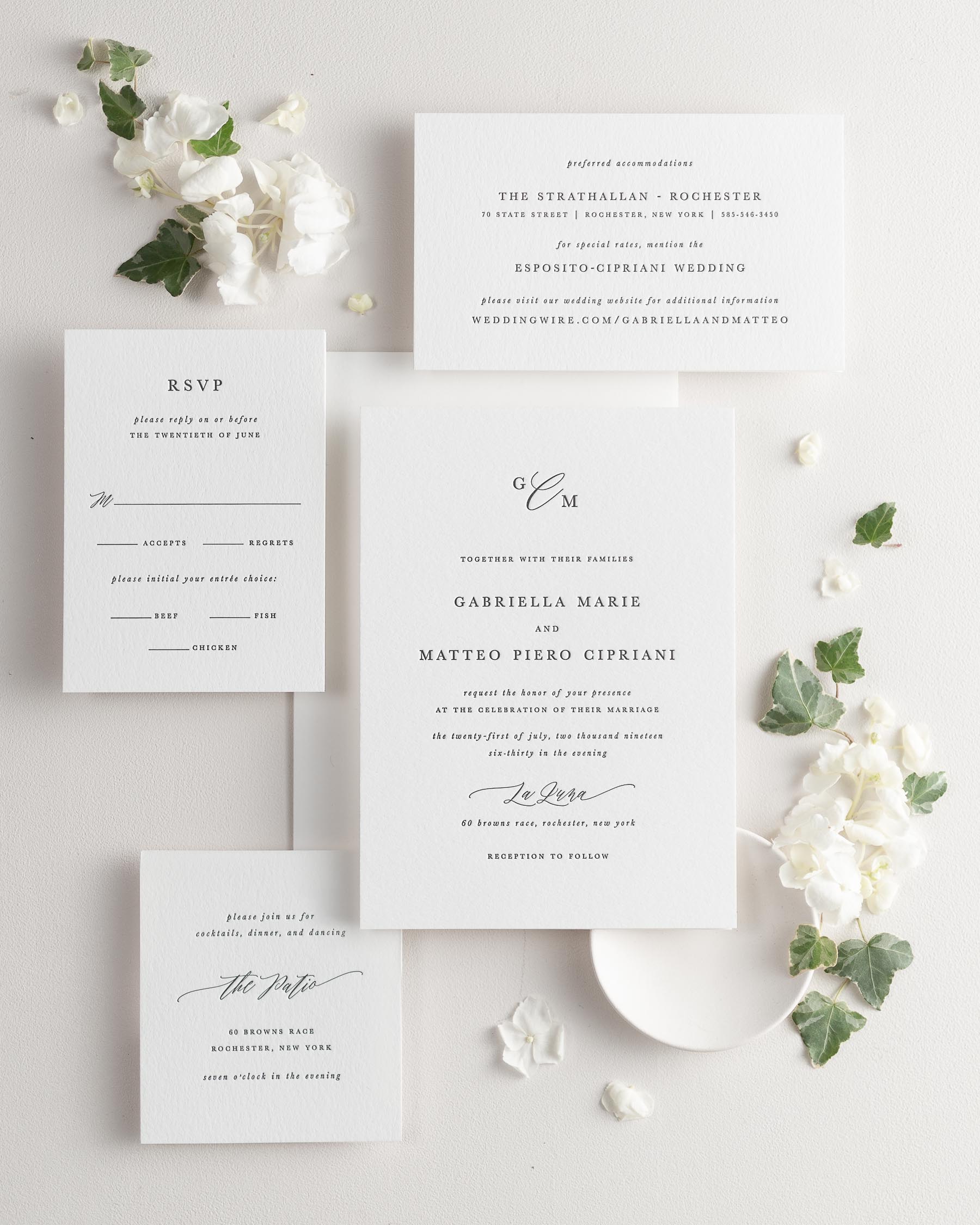 All pieces of the Gabriella letterpress wedding invitation suite, including the invitation, small and large enclosures, and response card.