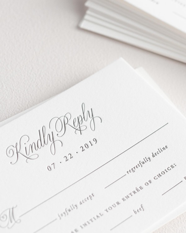 Dreamy close up shot of Garden Elegance response cards. Deep impressions in the paper are a result of the letterpress printing process.