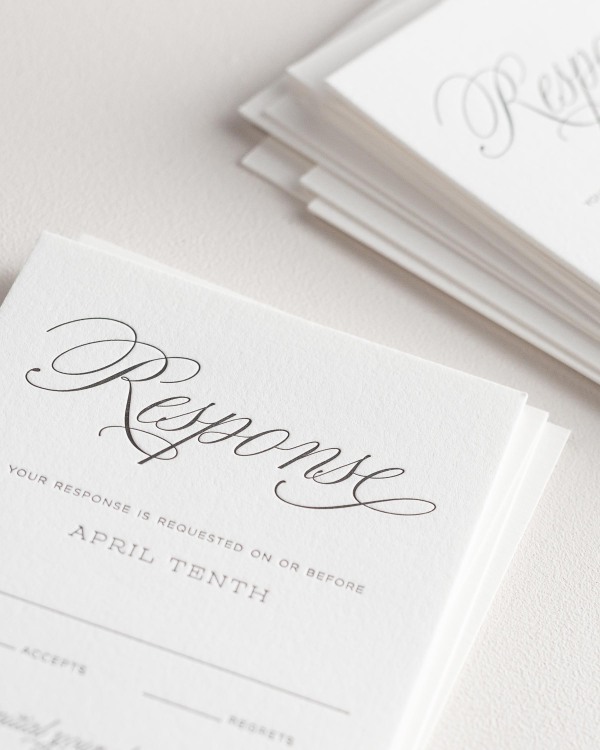 Dreamy close up shot of Garden Script response cards. Deep impressions in the paper are a result of the letterpress printing process.