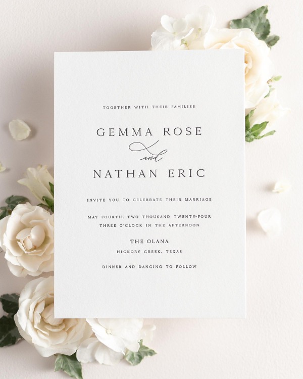 Gemma letterpress wedding invitation styled with pretty florals.