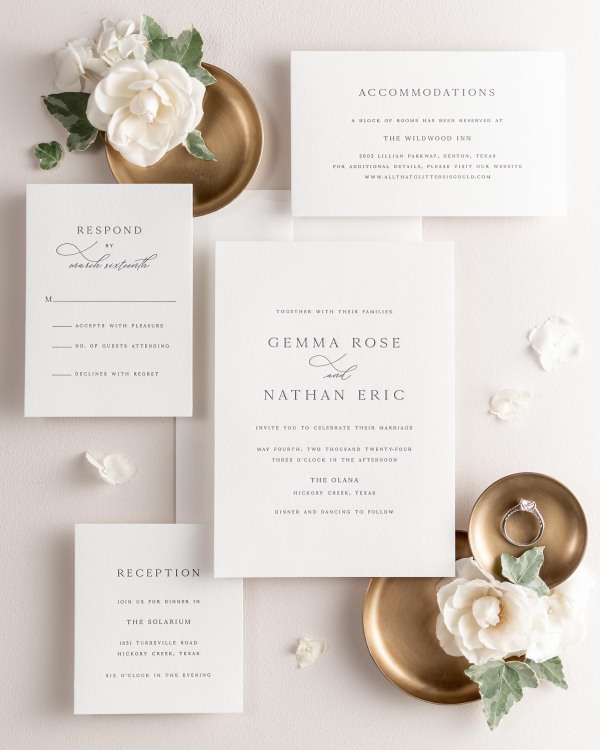 All pieces of the Gemma letterpress wedding invitation suite, including the invitation, small and large enclosures, and response card.