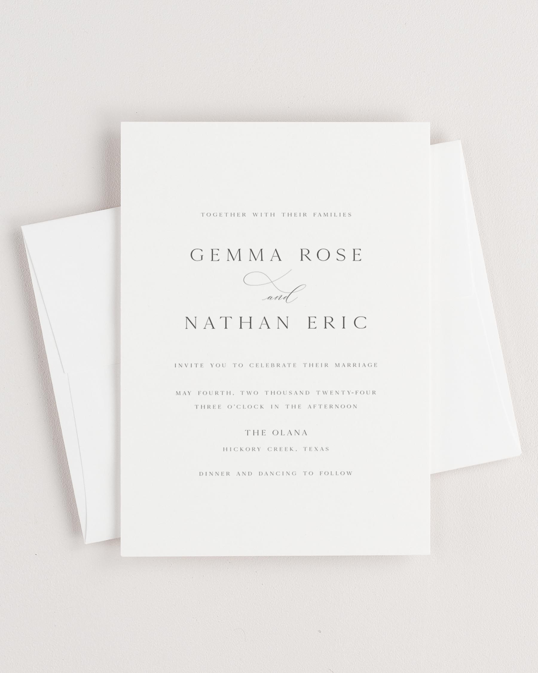 Simple close-up of Gemma invitation with an envelope.