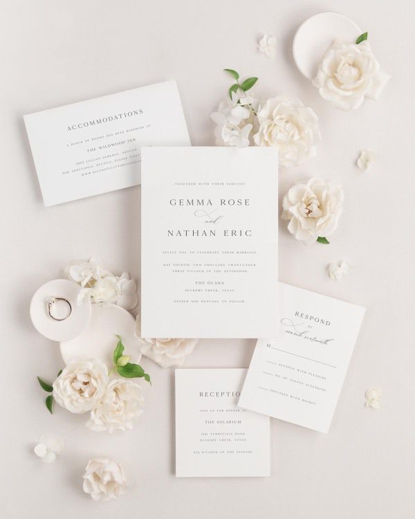 Gemma wedding invitations flat lay with
