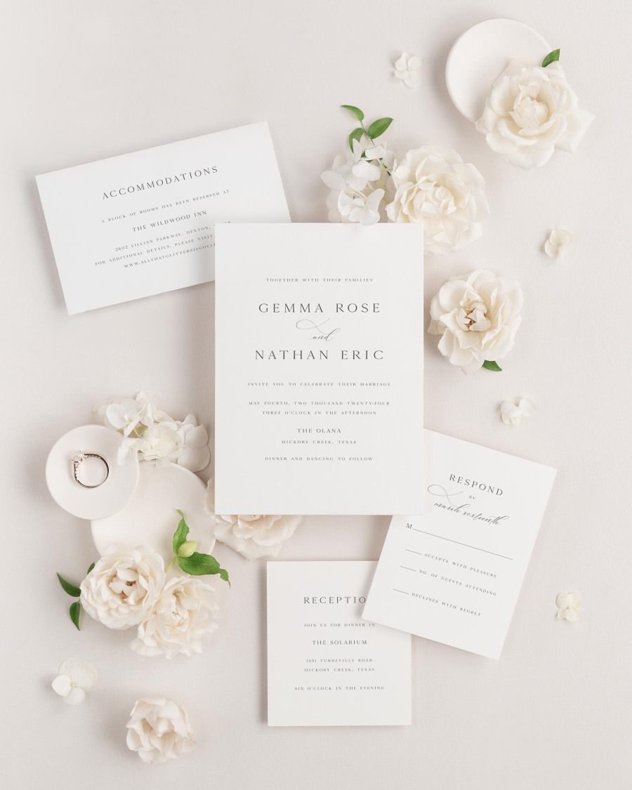 Gemma wedding invitations flat lay with