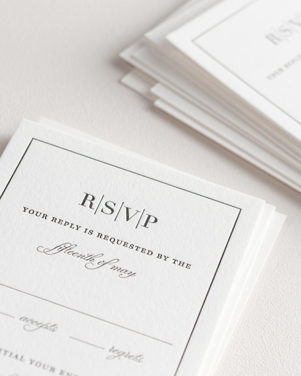 Dreamy close up shot of Glam Monogram response cards. Deep impressions in the paper are a result of the letterpress printing process.