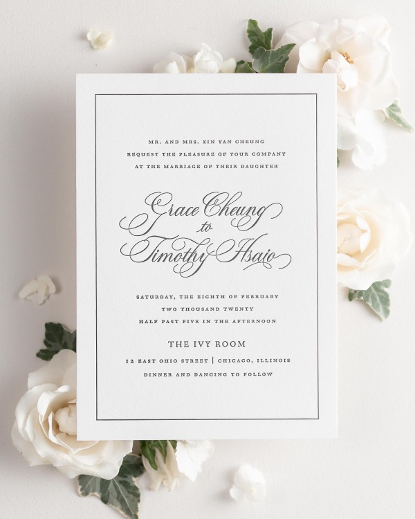 Grace letterpress wedding invitation styled with pretty florals.