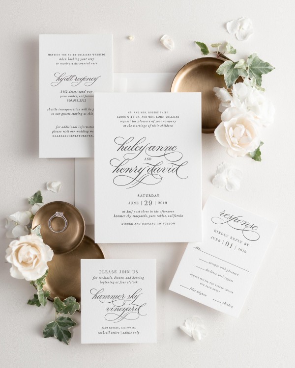 All pieces of the Haley letterpress wedding invitation suite, including the invitation, small and large enclosures, and response card.
