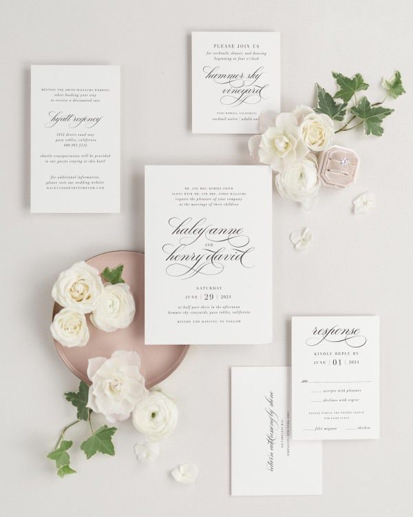 Haley wedding invitations flat lay with matching enclosure cards