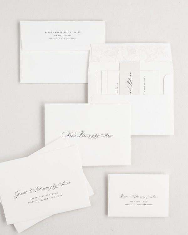 Hazel wedding invitation envelopes with guest addressing, return addressing, and name printing services. Inner envelope features a garden rose liner and nude belly band.