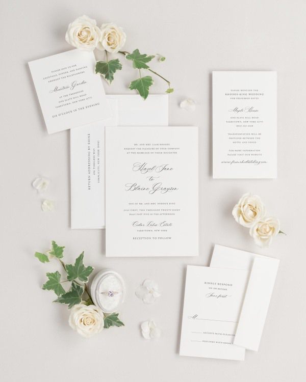 Hazel wedding invitations flat lay