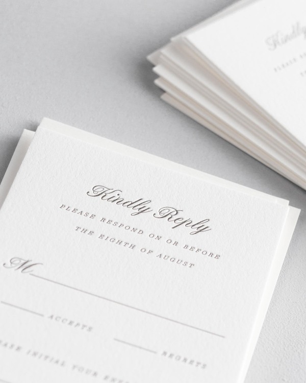 Dreamy close up shot of Jennifer response cards. Deep impressions in the paper are a result of the letterpress printing process.