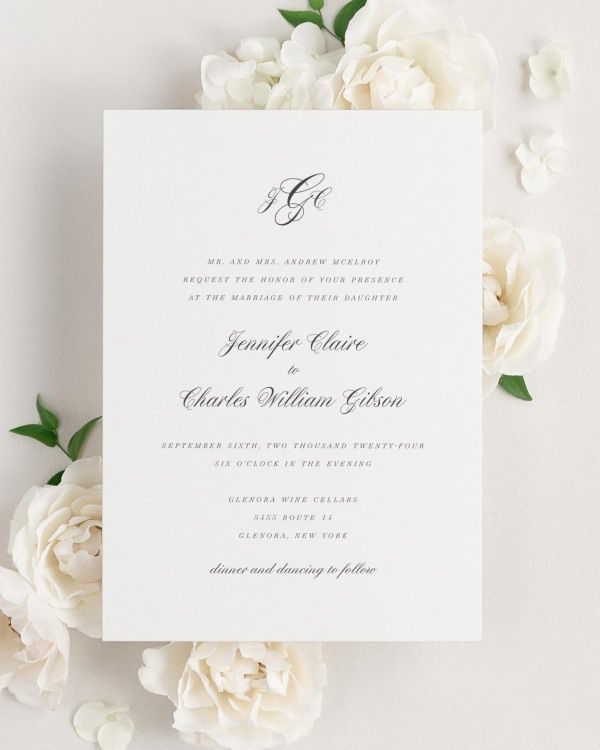 Jennifer wedding invitation framed with dreamy florals.
